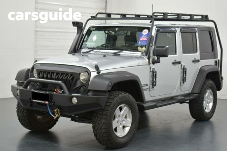 Silver 2010 Jeep Wrangler Softtop Unlimited Sport (4X4)