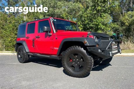 Red 2008 Jeep Wrangler Softtop Unlimited Sport (4X4)