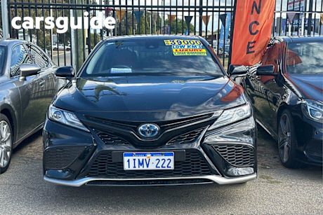 Black 2024 Toyota Camry Sedan SX Hybrid
