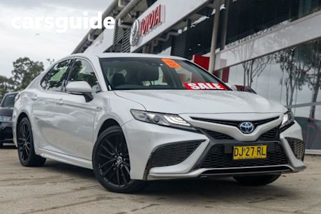 White 2023 Toyota Camry Sedan SX Hybrid