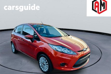 Orange 2010 Ford Fiesta Hatchback LX