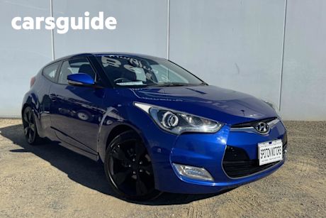 Blue 2012 Hyundai Veloster Coupe +