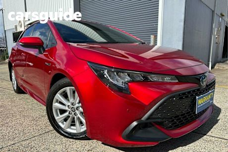 Red 2023 Toyota Corolla Hatchback Ascent Sport + Conv PK Hybrid