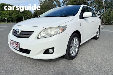 White 2010 Toyota Corolla Sedan Conquest