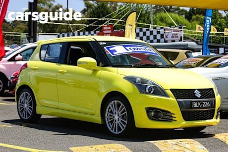 Yellow 2015 Suzuki Swift Hatchback Sport