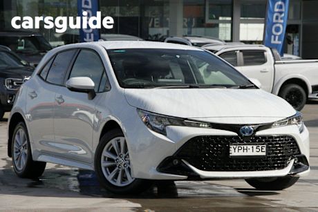 White 2024 Toyota Corolla Hatchback SX Hybrid