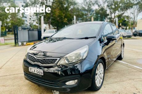 Black 2012 Kia RIO Sedan Si Automatic
