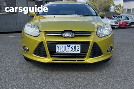 Yellow 2011 Ford Focus Hatchback Trend