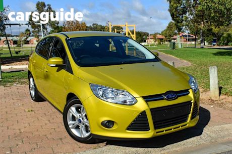 Yellow 2012 Ford Focus Hatchback Trend