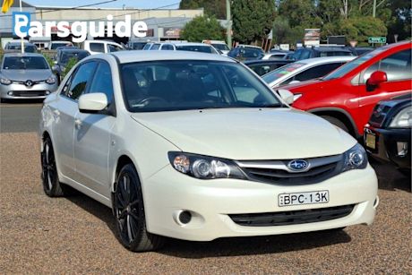 White 2010 Subaru Impreza Sedan R (awd)