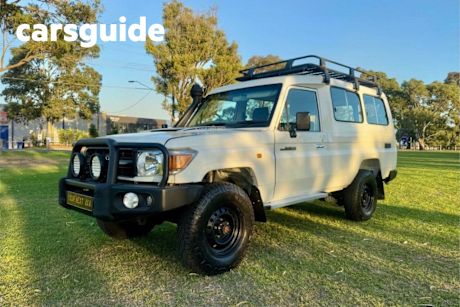 White 2010 Toyota Landcruiser Troop Carrier Workmate (4X4) 11 Seat