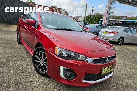 Red 2015 Mitsubishi Lancer Sedan ES Sport