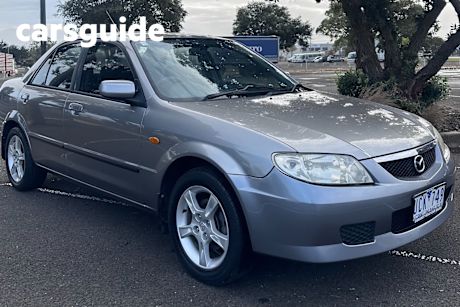 Grey 2003 Mazda 323 Sedan Protege