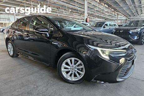 Black 2023 Toyota Corolla Sedan SX Hybrid