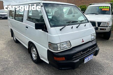 White 2009 Mitsubishi Express Window Van SWB