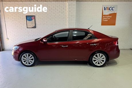 Red 2010 Kia Cerato Sedan SLI