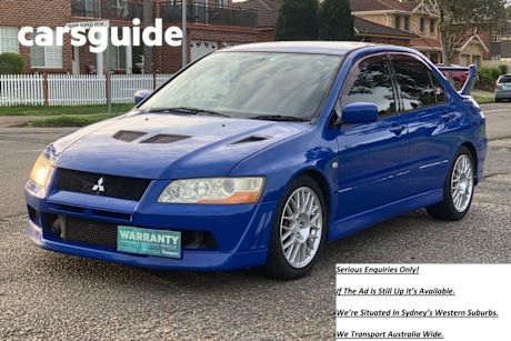 Blue 2001 Mitsubishi Lancer Sedan Evolution VII