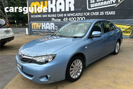 Blue 2010 Subaru Impreza Sedan R (awd) RE