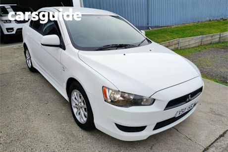 White 2010 Mitsubishi Lancer Sedan Activ