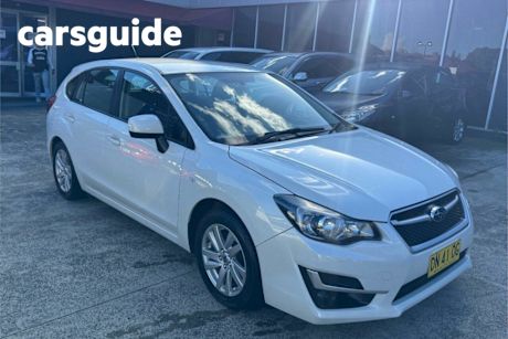 White 2015 Subaru Impreza Hatchback 2.0I (awd)