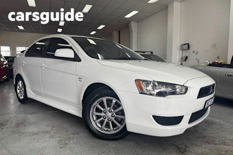 White 2012 Mitsubishi Lancer Sedan Platinum Edition