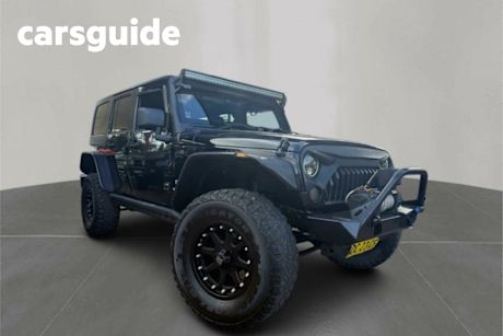 Black 2013 Jeep Wrangler Hardtop Unlimited Renegade Sport (4X4)