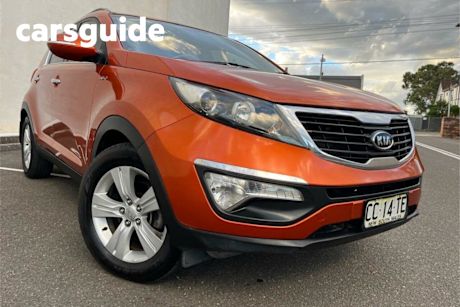 Orange 2010 Kia Sportage Wagon SLI (awd)