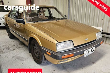 Gold 1986 Ford Telstar Sedan Ghia