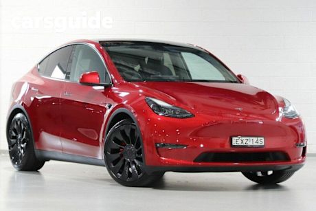 Red 2023 Tesla Model Y Wagon Performance