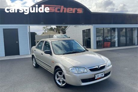 Silver 1998 Mazda 323 Sedan Protege