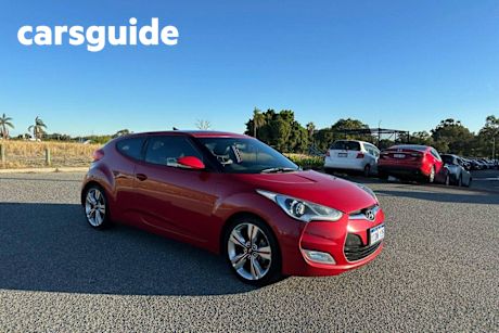 Red 2013 Hyundai Veloster Coupe +