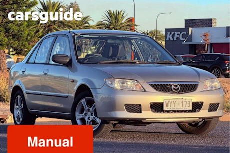 Silver 2003 Mazda 323 Sedan Protege