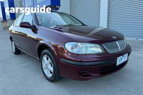Red 2003 Nissan Pulsar Sedan ST-L