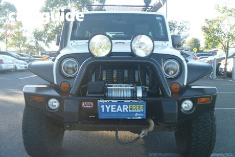 White 2010 Jeep Wrangler Softtop Unlimited Sport (4X4)