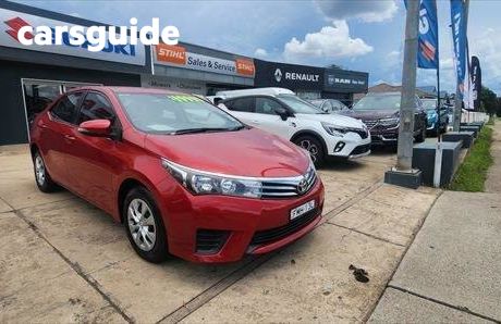 Red 2015 Toyota Corolla Sedan Ascent