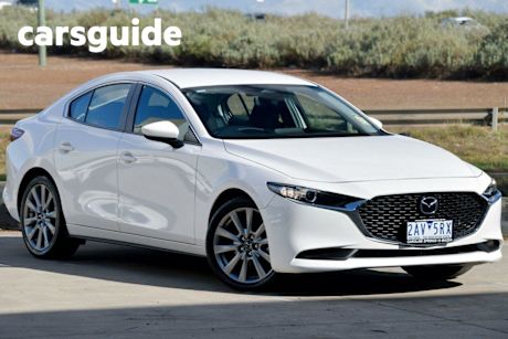 White 2024 Mazda 3 Sedan G20 Evolve