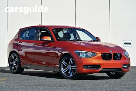 Orange 2012 BMW 116I Hatchback