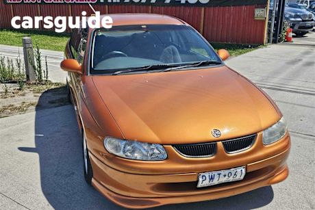 Orange 1999 Holden Commodore Sedan S