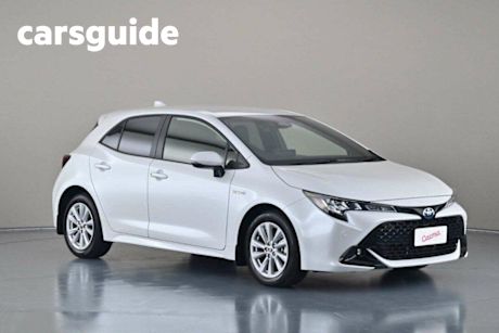 White 2023 Toyota Corolla Hatchback SX Hybrid