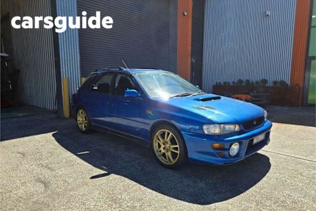Blue 2000 Subaru Impreza Hatchback WRX LTD ED Club Spec EVO IV
