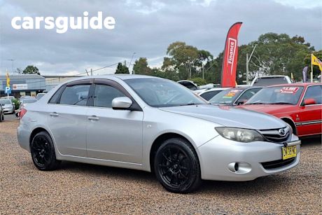 Silver 2010 Subaru Impreza Sedan R (awd) RE