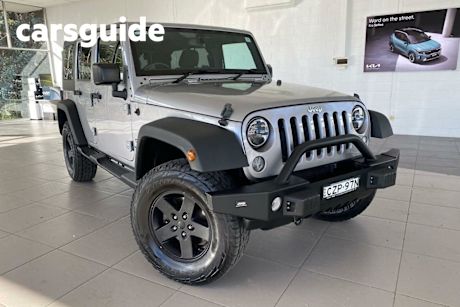Silver 2015 Jeep Wrangler Unlimited Softtop Sport (4X4)
