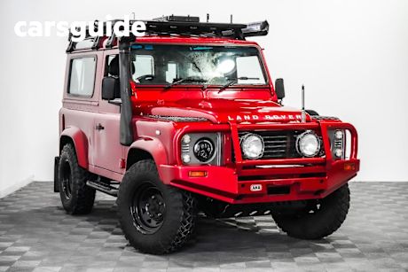 Red 2012 Land Rover Defender Wagon 90