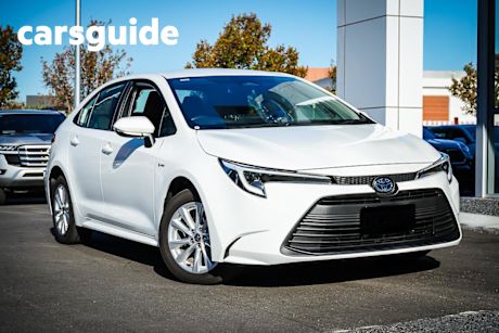 White 2024 Toyota Corolla Sedan Ascent Sport HEV