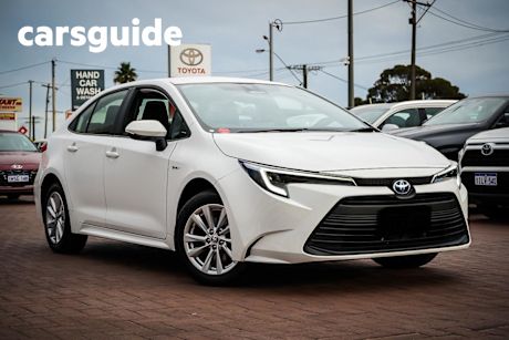 White 2024 Toyota Corolla Sedan Ascent Sport HEV