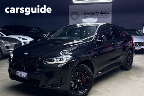 Black 2024 BMW X4 Coupe M Competition