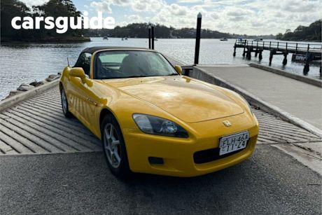 Yellow 1999 Honda S2000 Convertible