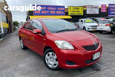 Red 2009 Toyota Yaris Sedan YRS