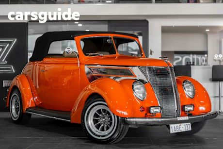 Orange 1937 Ford Deluxe Convertible Model 78