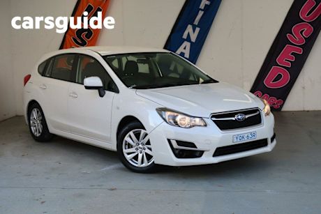 White 2015 Subaru Impreza Hatchback 2.0I-L (awd)